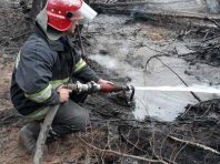Дощ не погасив всі пожежі у Чорнобилі
