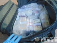 У Києві затримали шахрая, який “обміняв” понад 33 тис. дол. на сувенірні гривні
