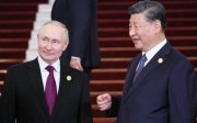 Путін та СІ