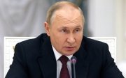 путін
